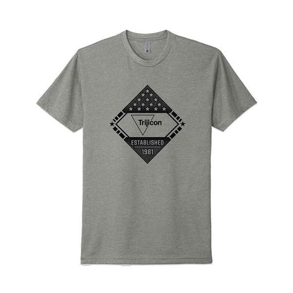 A gray t-shirt with a black graphic design featuring the Trijicon logo and the year 1981.