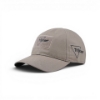 Side angle of khaki cap with tonal Trijicon logo detail